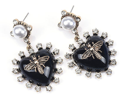 Pearl heart drop earrings with gold bee charm