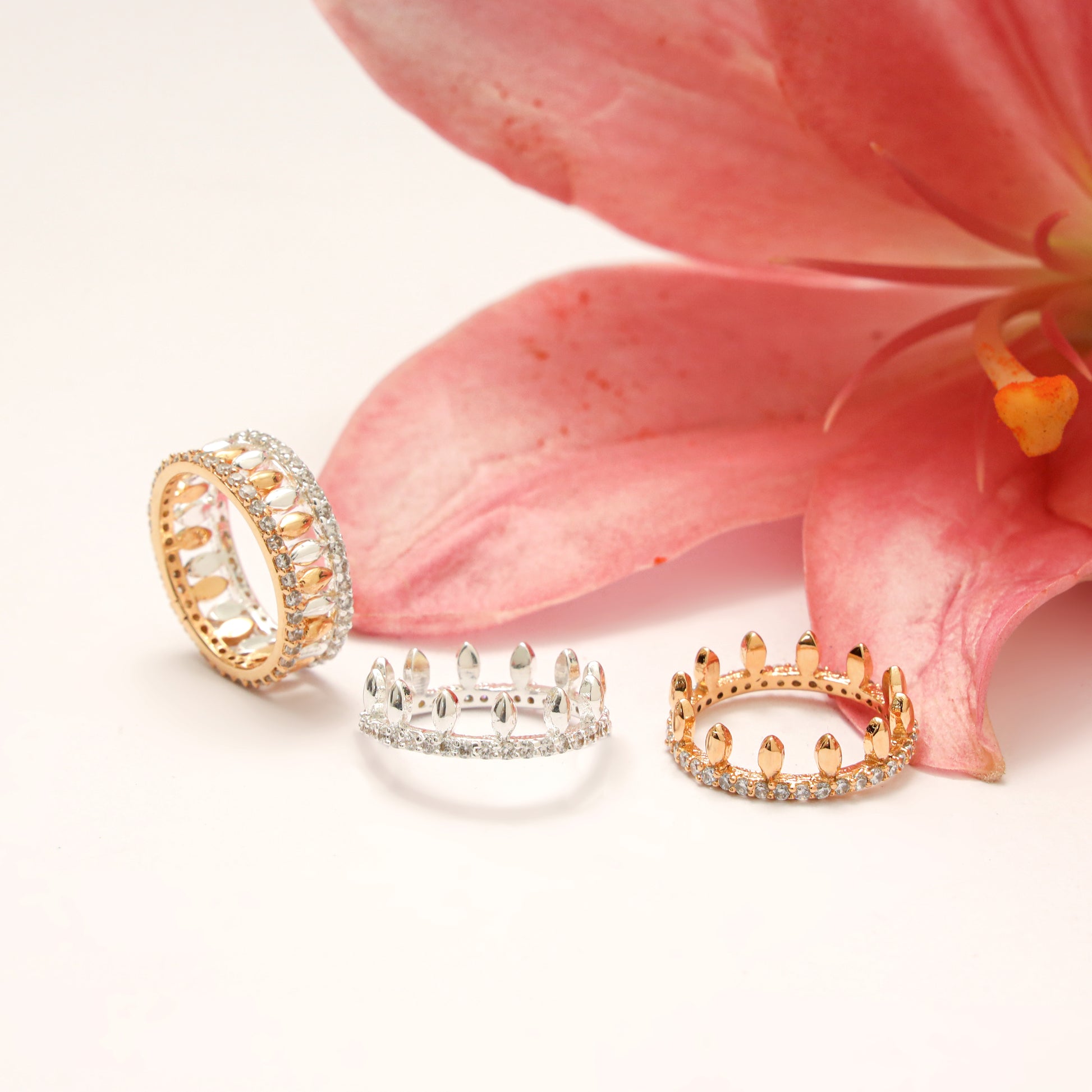 gold and silver toned detachable rings in the shape of crown 